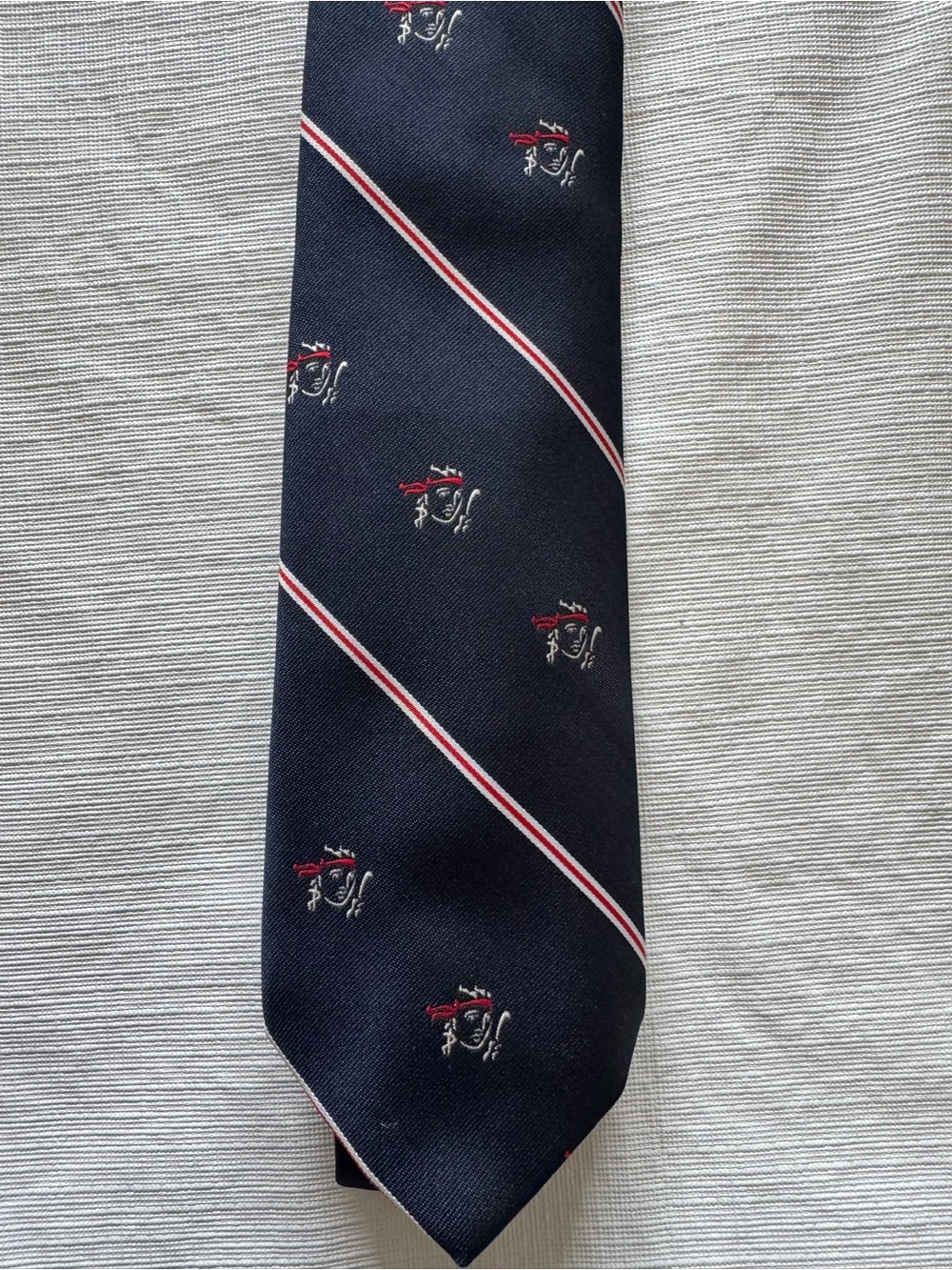 4/25 Frame Denim Navy Tie with Red and White Diagonal Stripes and Crest Motifs